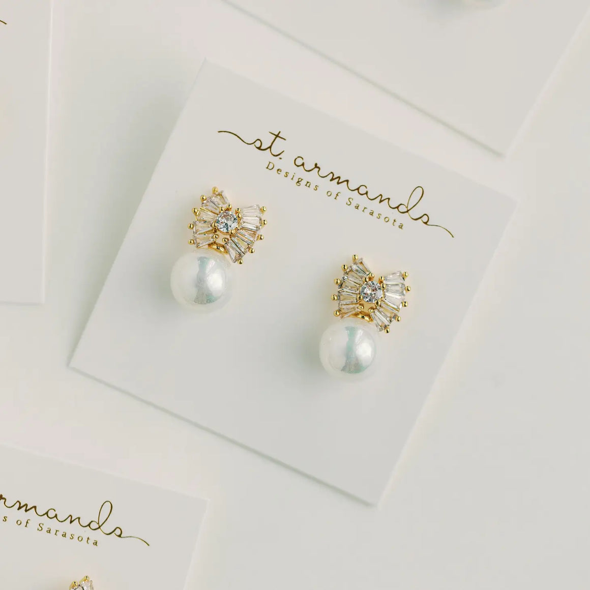 EARRINGS - STATEMENT GOLD PEARL SPARKLER BOW