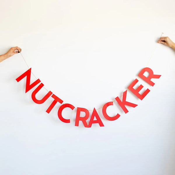 WORD MIX GARLAND - ELF "SON OF A NUTCRACKER" © & ™ New Line Productions, Inc.